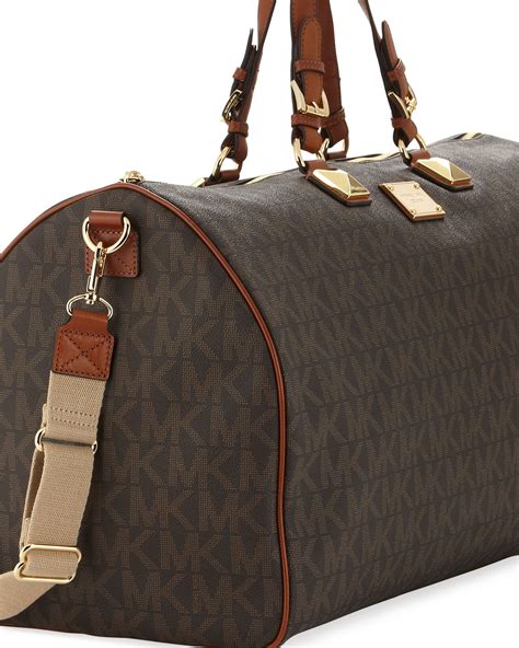 michael kors duffle bag black|michael kors travel bag outlet.